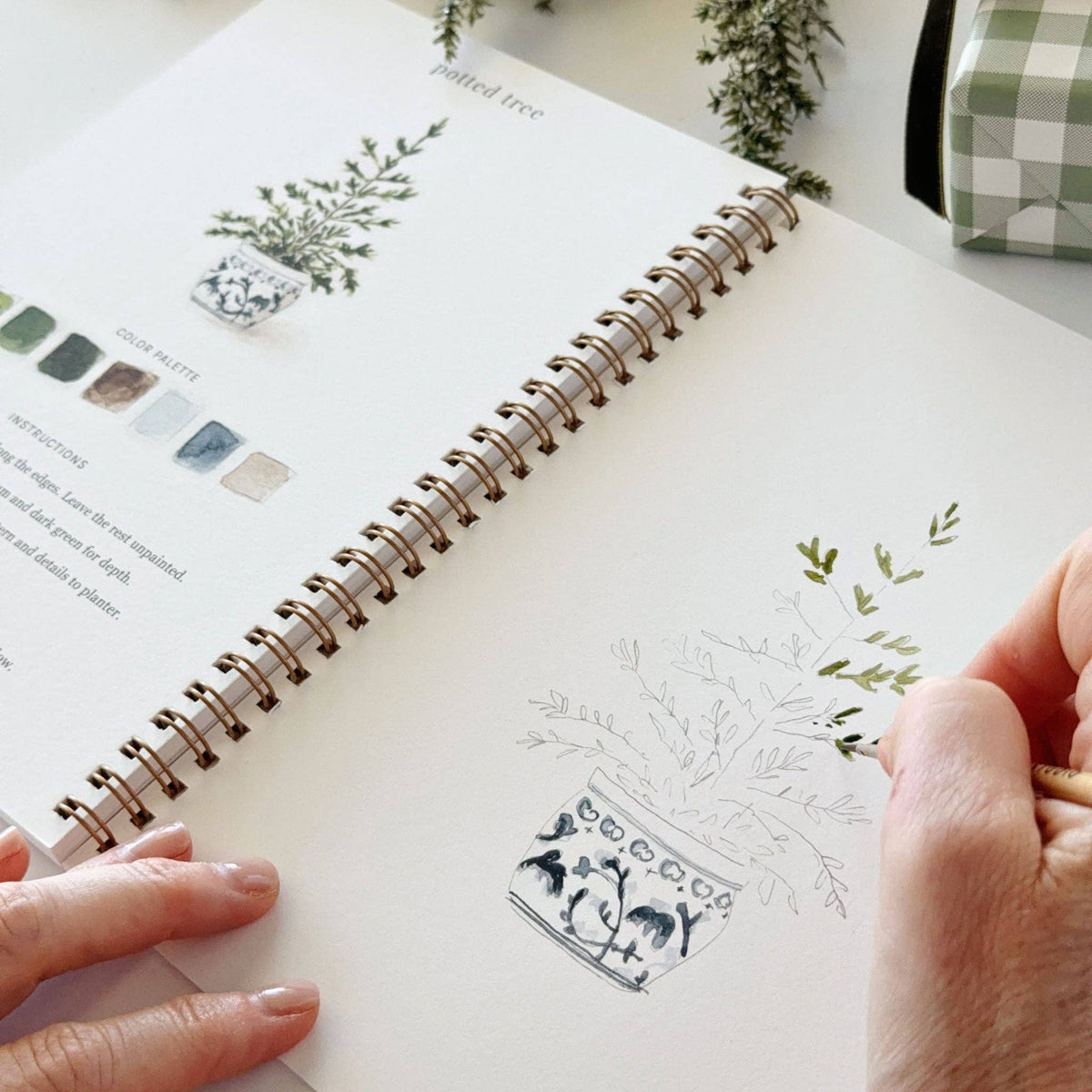 Classic Christmas Watercolor Workbook by Emily Lex featuring beginner-friendly holiday watercolor painting projects.
