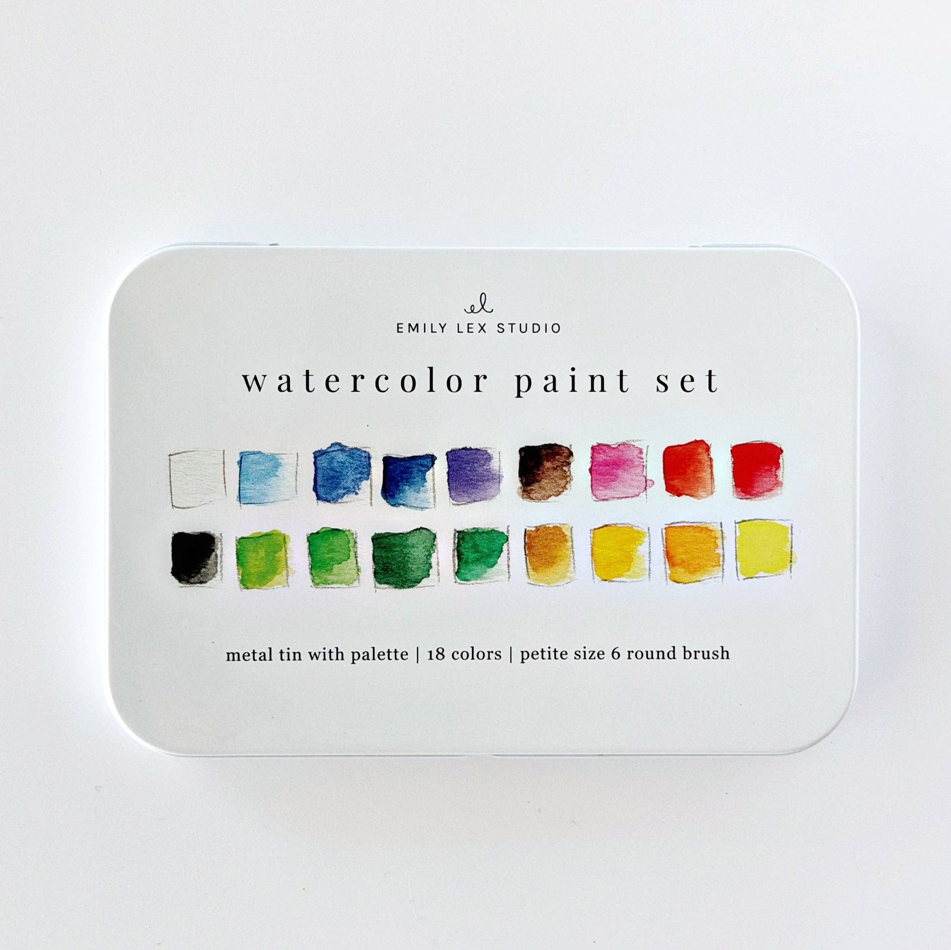 Compact watercolor paint set with 18 vibrant colors, built-in mixing palette, color swatching card, and included paintbrush.