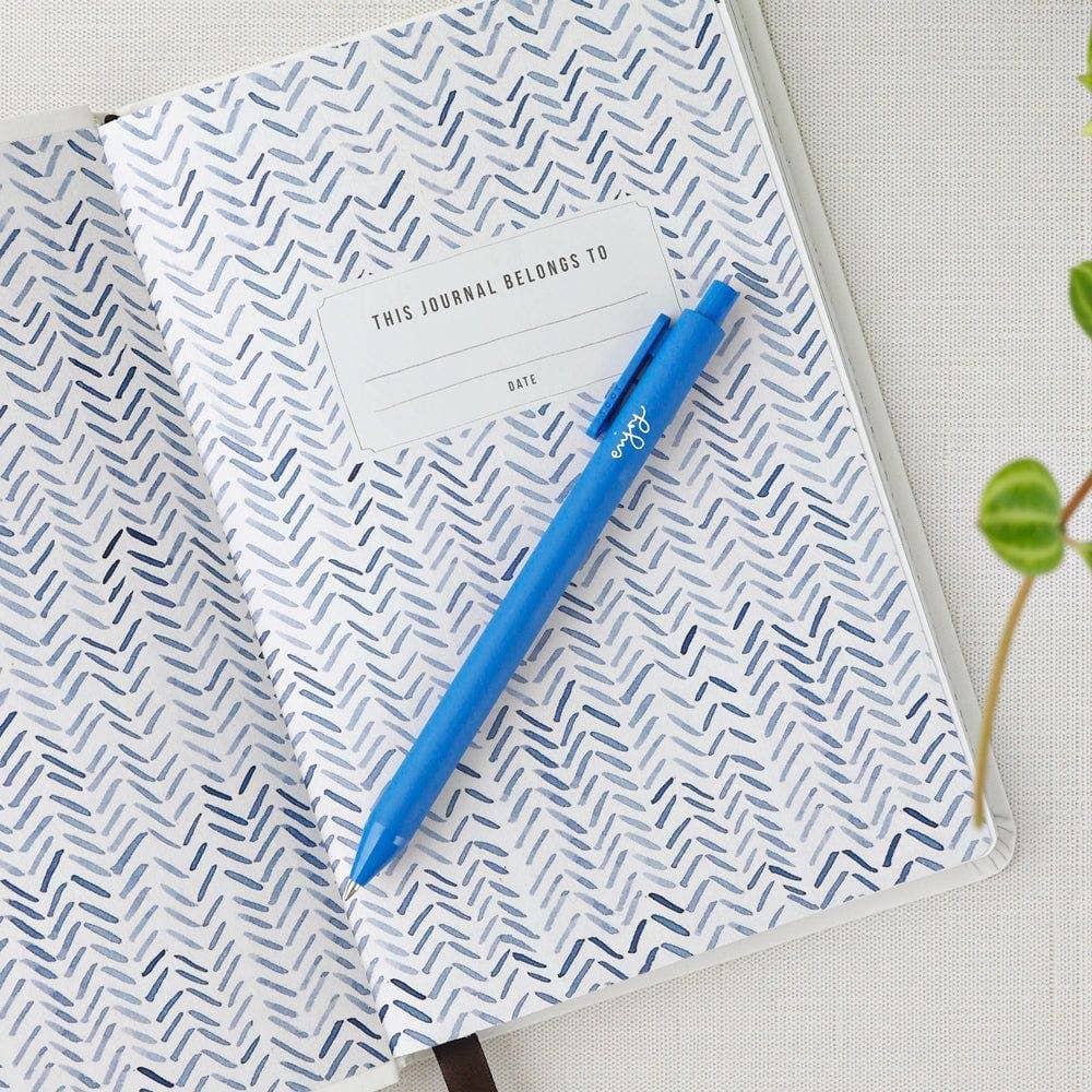 Matte finish gel ink pen featuring the word “enjoy” in handwritten script.
