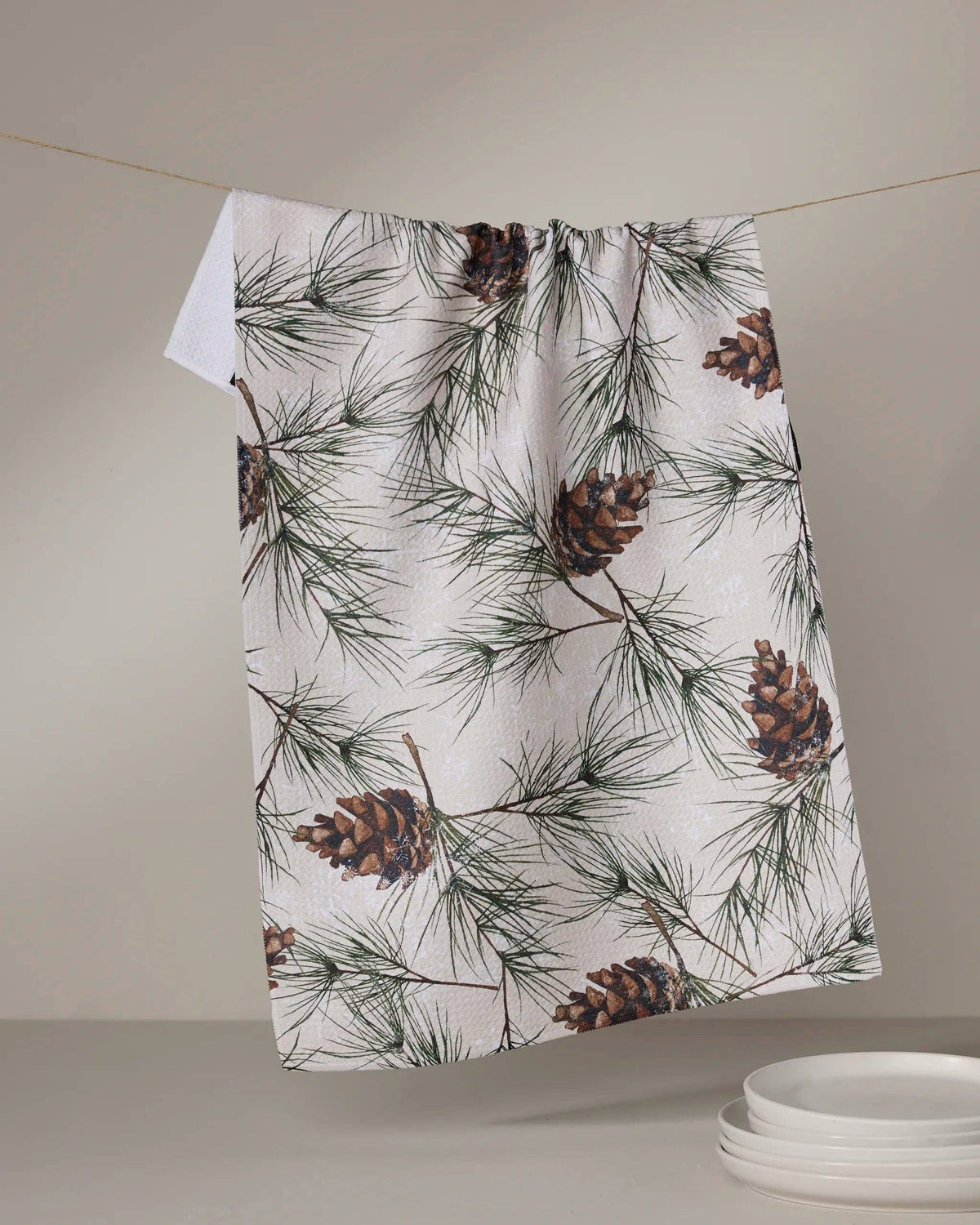 Evergreen Frost Geometry tea towel featuring a winter evergreen-inspired design on ultra-absorbent, quick-drying Geoweave fabric.