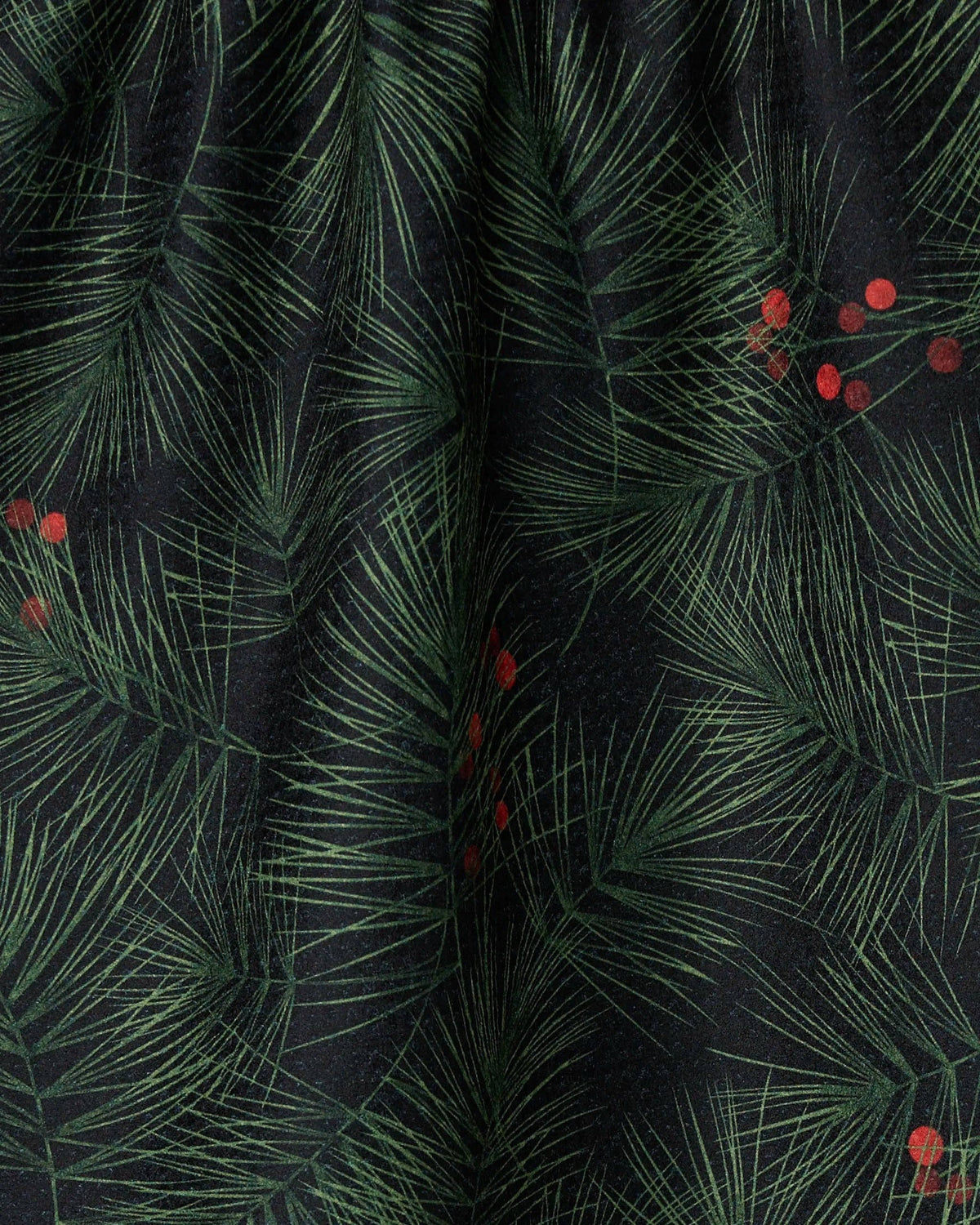 Close-up of the Evergreen Pine tea towel showing Geometry's tightly woven Geoweave fabric and seasonal pine design.