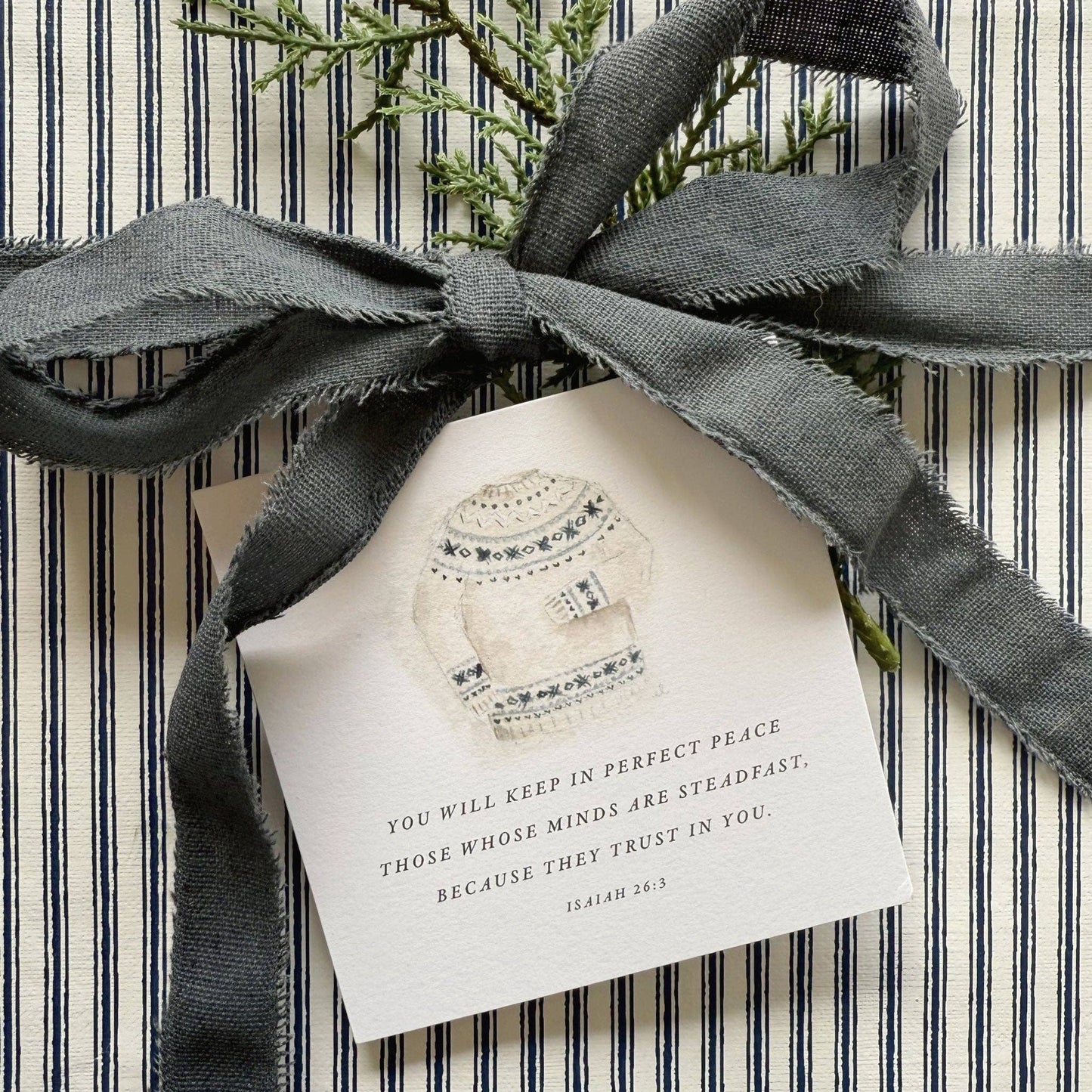 Emily Lex Christmas Scripture card set styled with wrapped gifts, linen ribbon, pinecones, and holiday greenery, creating a meaningful faith-filled Christmas tradition.