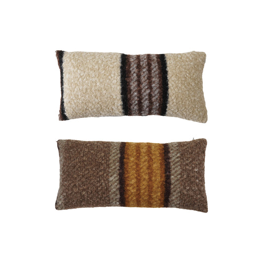 Faux sherpa striped lumbar pillows in Cream · Chocolate and Mocha · Ochre colorways with plush boucle-like texture.