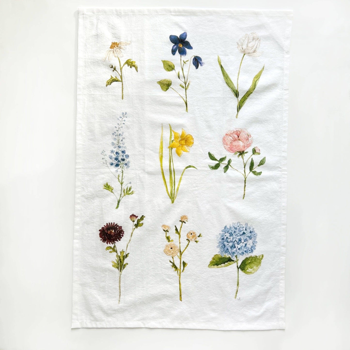 Botanical garden flower watercolor illustrations printed on a soft cotton flour sack tea towel.