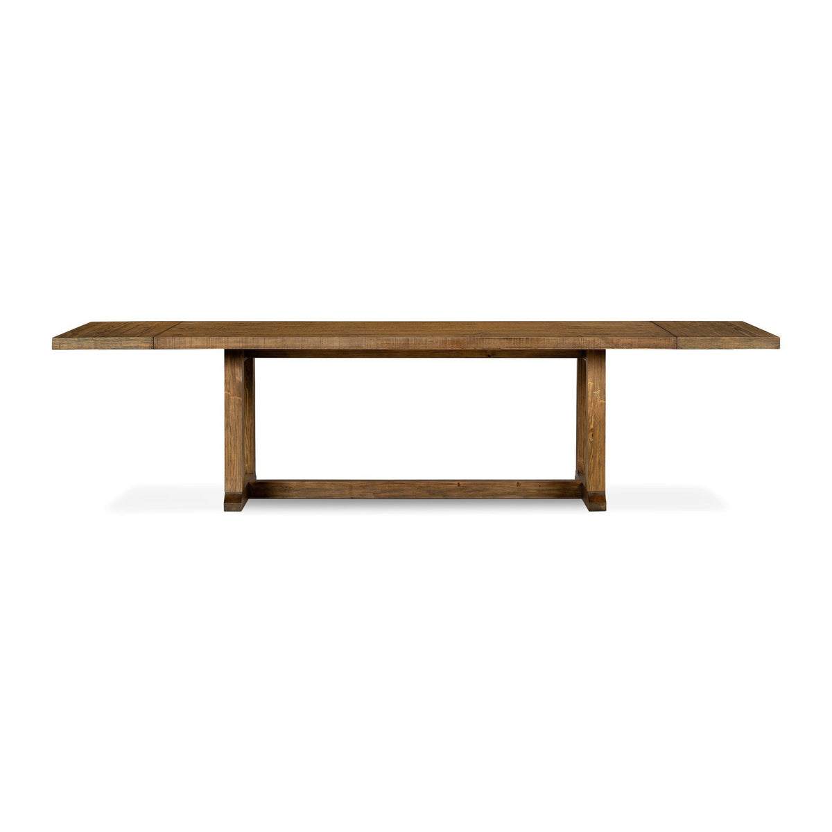 Side view of the Foundry Pine Extension Dining Table showing its solid pine trestle construction.