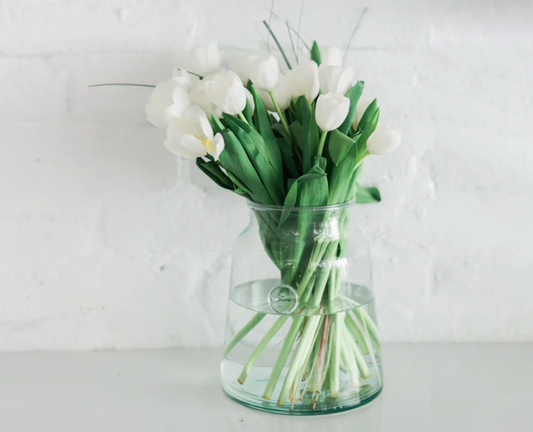 French bee glass mason jar made from recycled mouth-blown glass styled with fresh blooms in a collected European-inspired home
