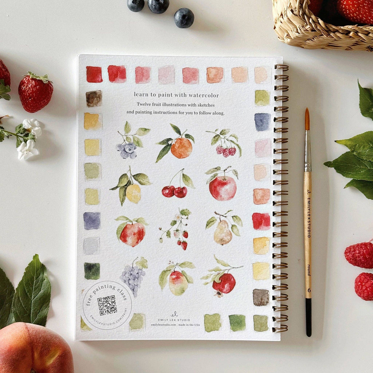 Fruit Watercolor Workbook featuring beginner-friendly pre-outlined fruit illustrations ready to paint.