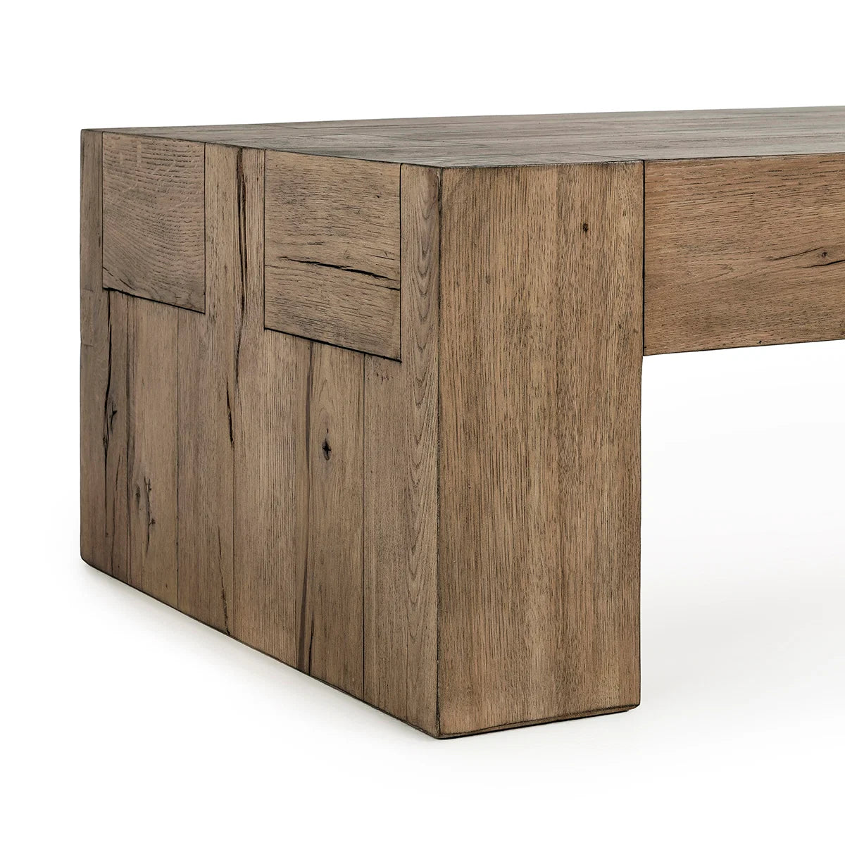 Close-up of the Bristol coffee table showcasing the reclaimed oak grain, natural cracks, exposed joinery, and warm Café Brown finish.