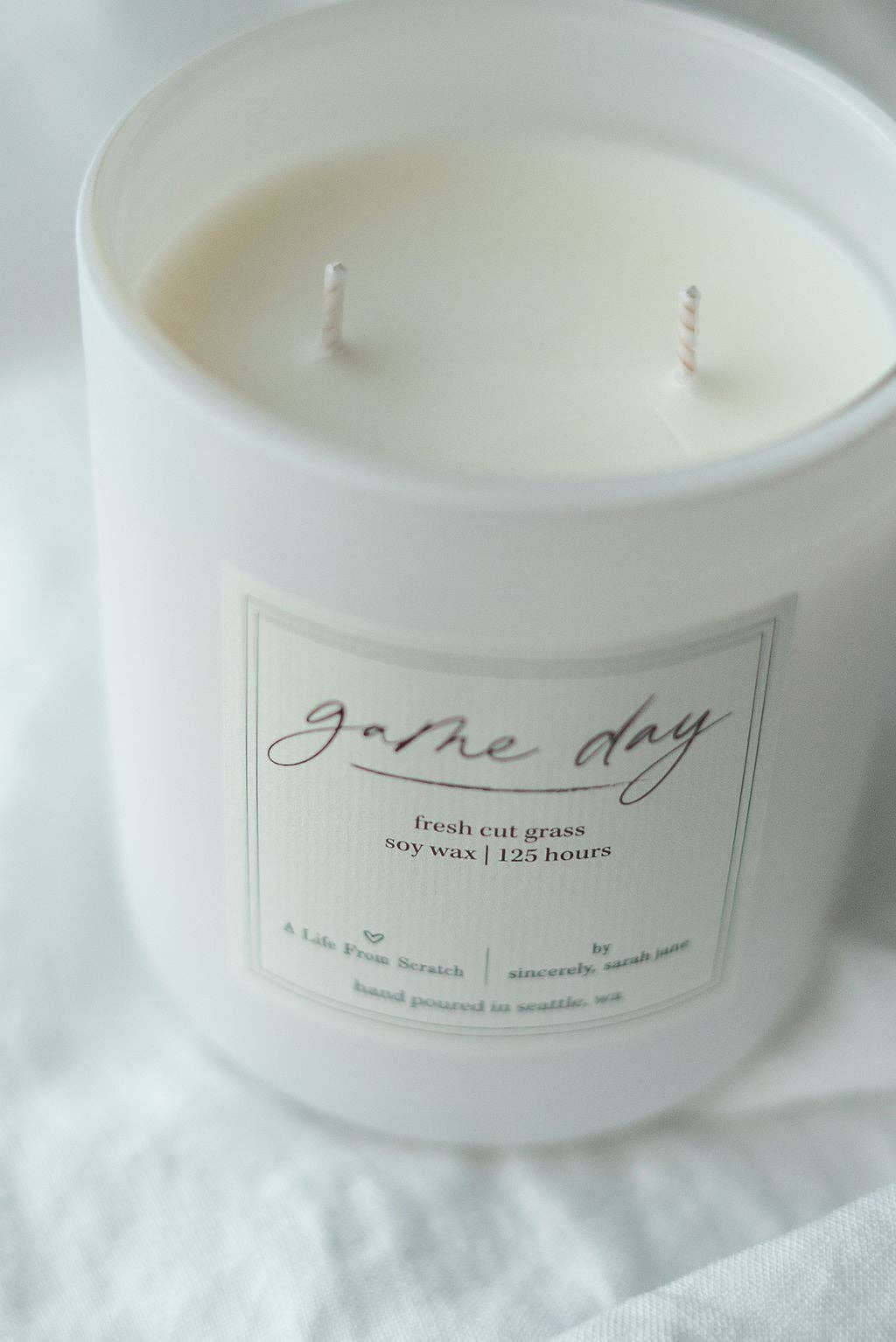 Game Day candle inspired by afternoons at the ballpark and the fresh scent of spring fields.