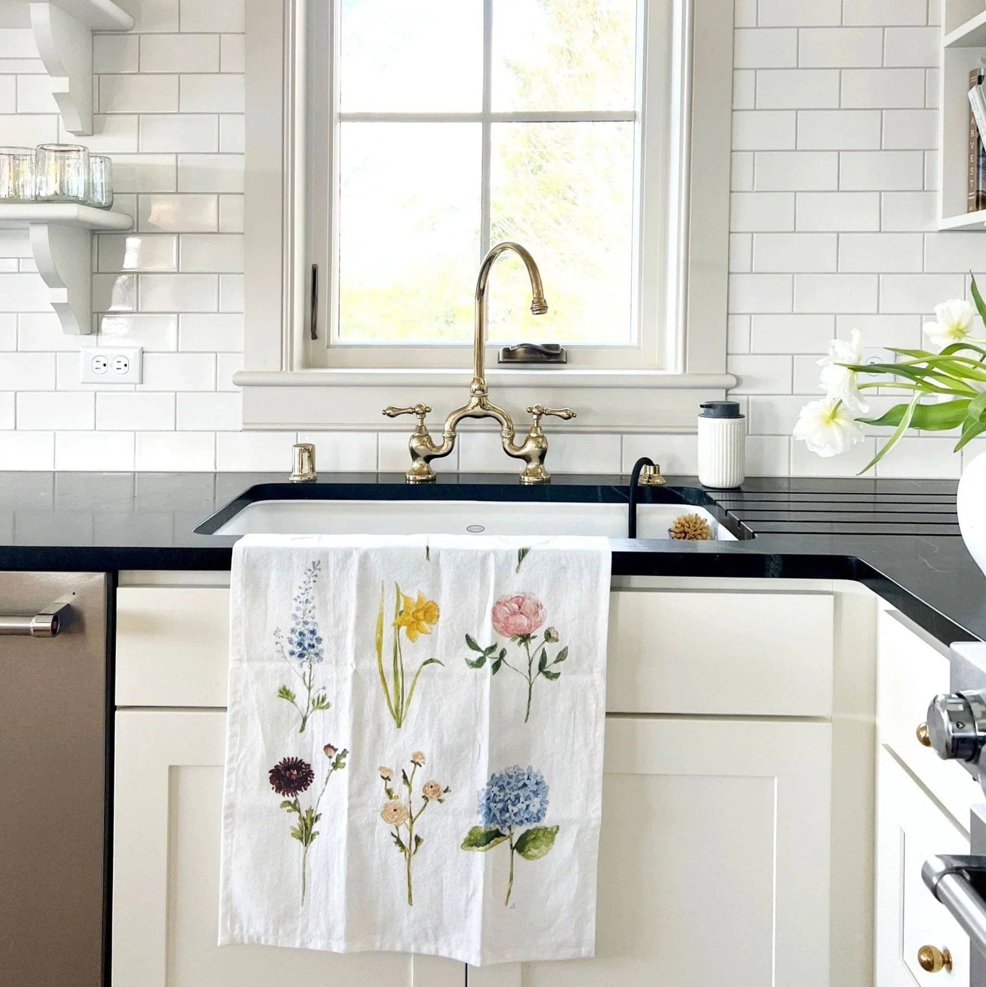 Botanical garden flower watercolor illustrations printed on a soft cotton flour sack tea towel.