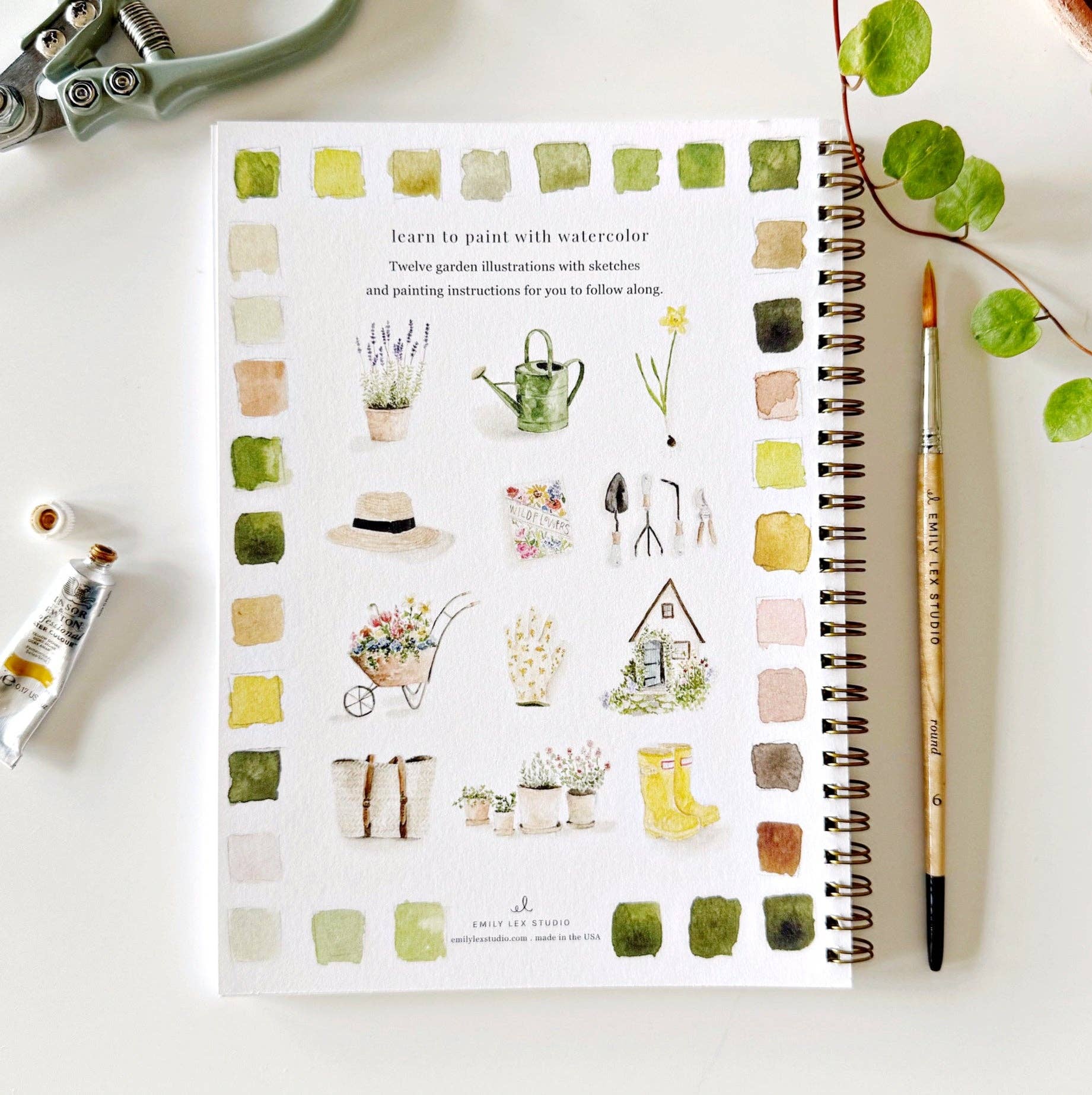 Garden Watercolor Workbook by Emily Lex featuring beginner-friendly botanical painting projects.