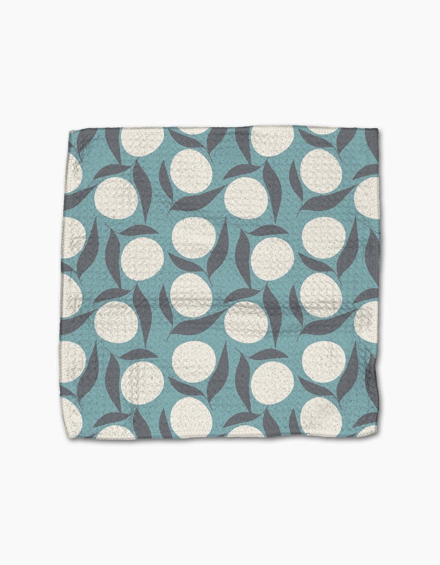 Close-up of the Polka Dot Blooms dishcloths showing Geometry's absorbent, quick-drying Geoweave fabric.