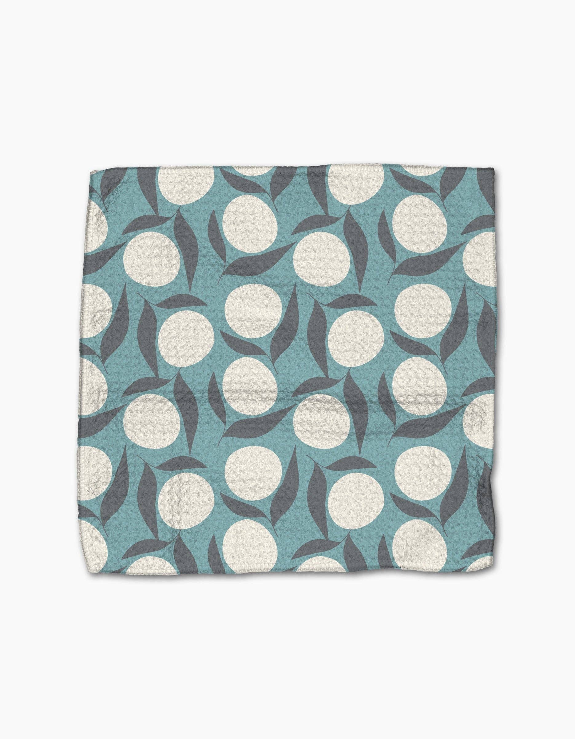 Close-up of the Polka Dot Blooms dishcloths showing Geometry's absorbent, quick-drying Geoweave fabric.