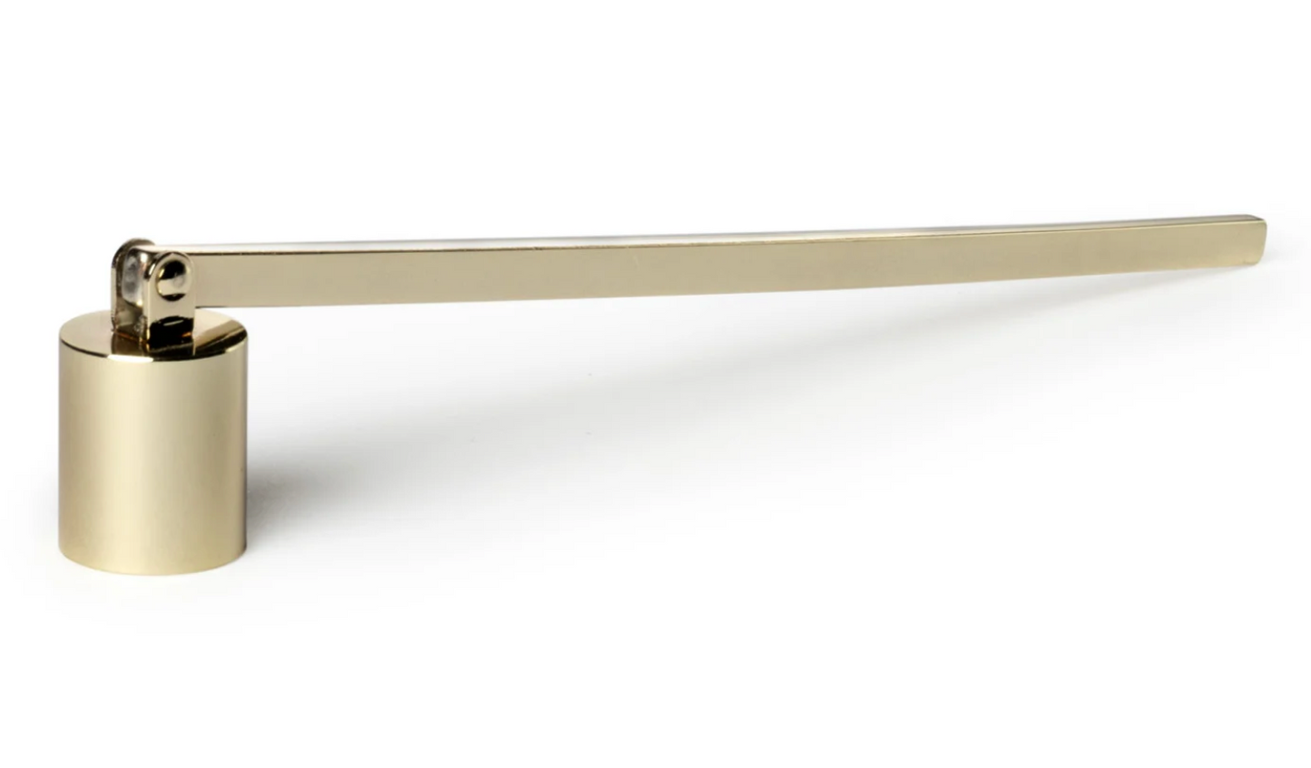 Gold metal candle snuffer designed to extinguish candle flames cleanly and safely.