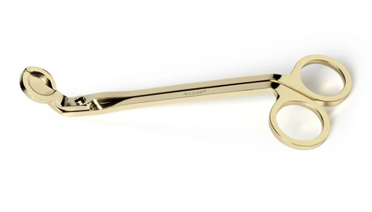 Gold candle wick trimmer designed to promote cleaner burns and extend candle life.