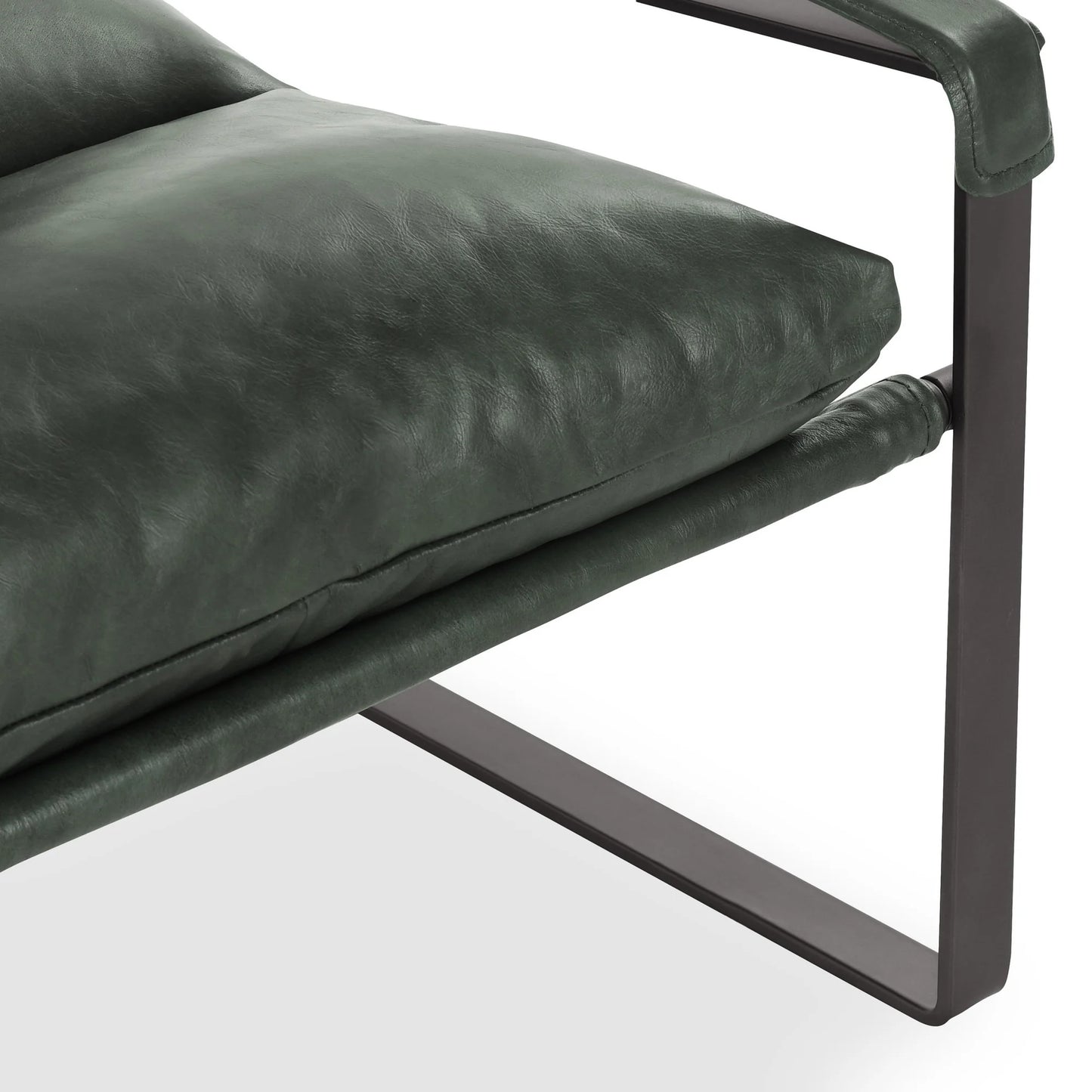 Close-up of the Morgan accent chair highlighting the rich Forest Green top-grain leather, leather-wrapped arms, and sleek iron frame.