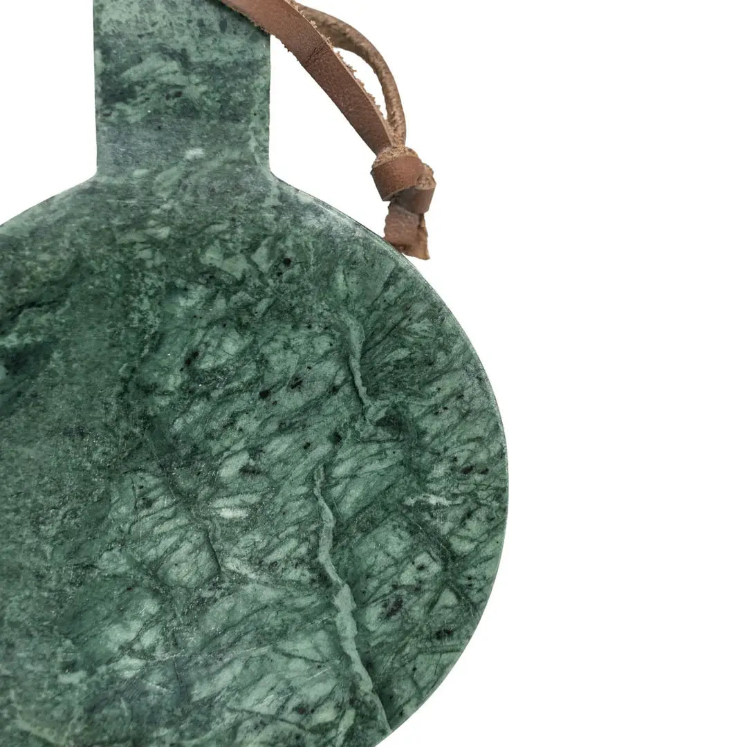 Close-up of the rich forest green Spider Green marble showcasing the unique natural veining and polished finish.