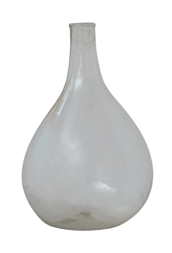 Hand-blown recycled glass bottle vase featuring artisan craftsmanship and sustainable materials.
