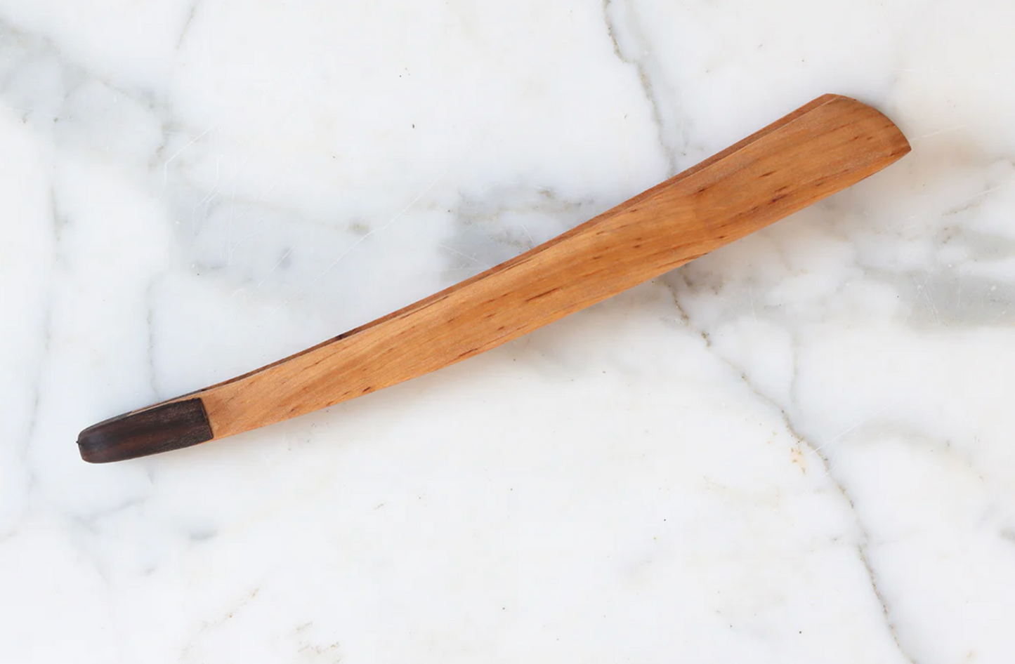 Wooden spatula on a marble surface