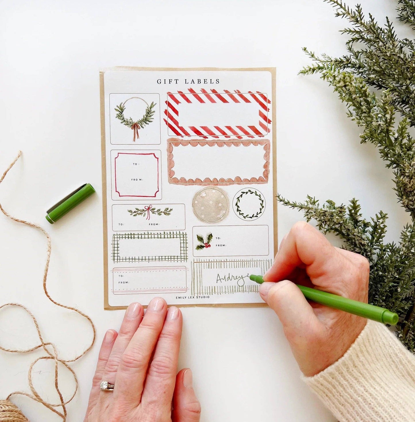 Christmas Gift Tag Sticker Sheets featuring 22 writable matte labels for beautifully wrapped holiday gifts.