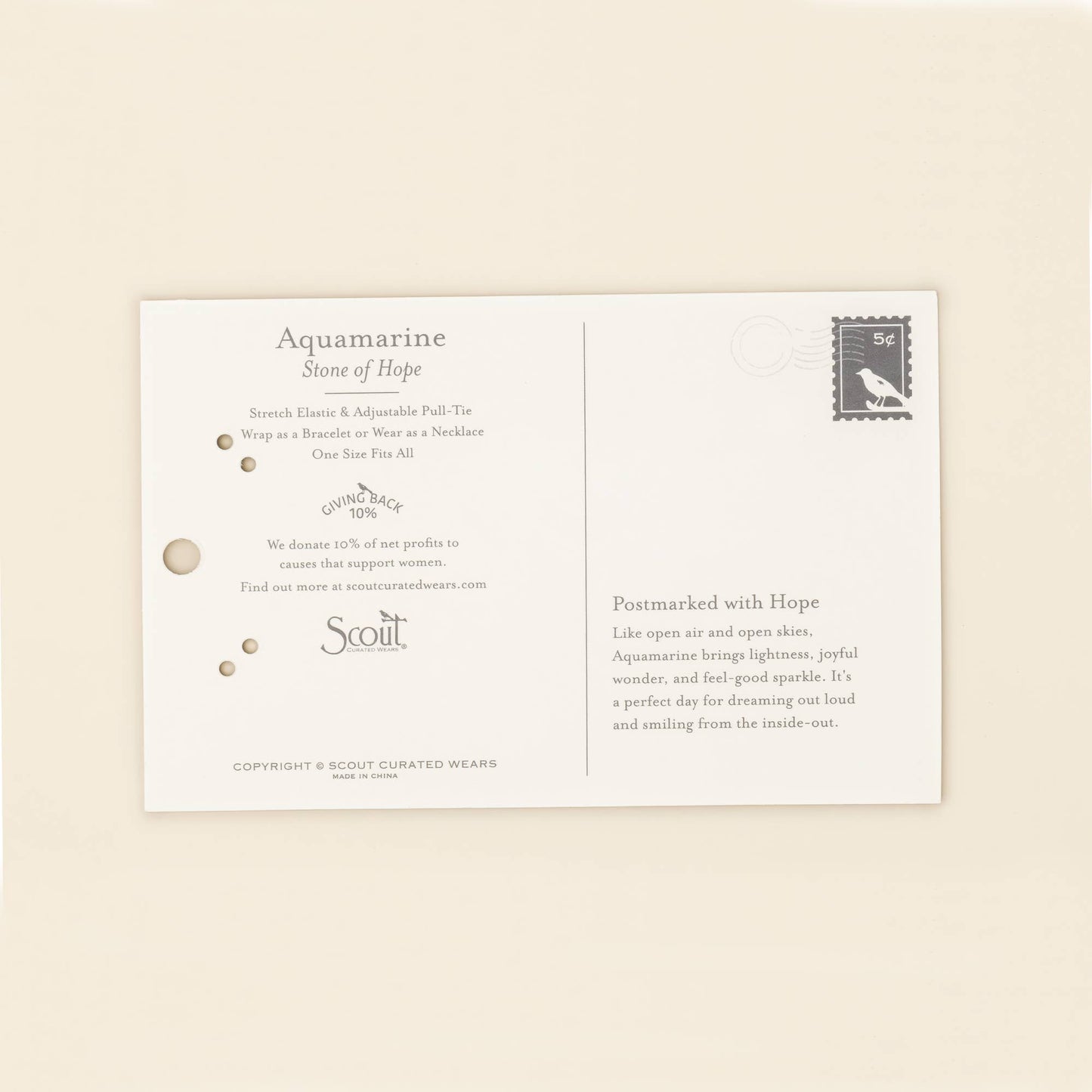 Product packaging for Aquamarine stone with brand name 'Scout' on a beige background
