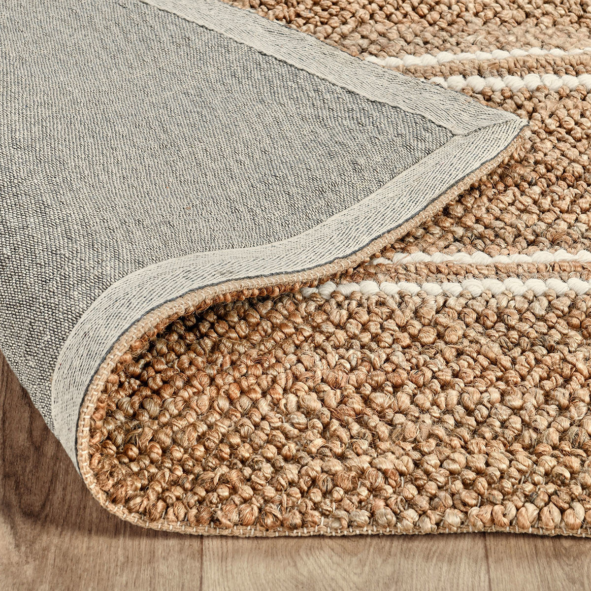 Close-up of the Madrid rug highlighting the natural woven texture and durable blend of jute, cotton, and wool fibers.