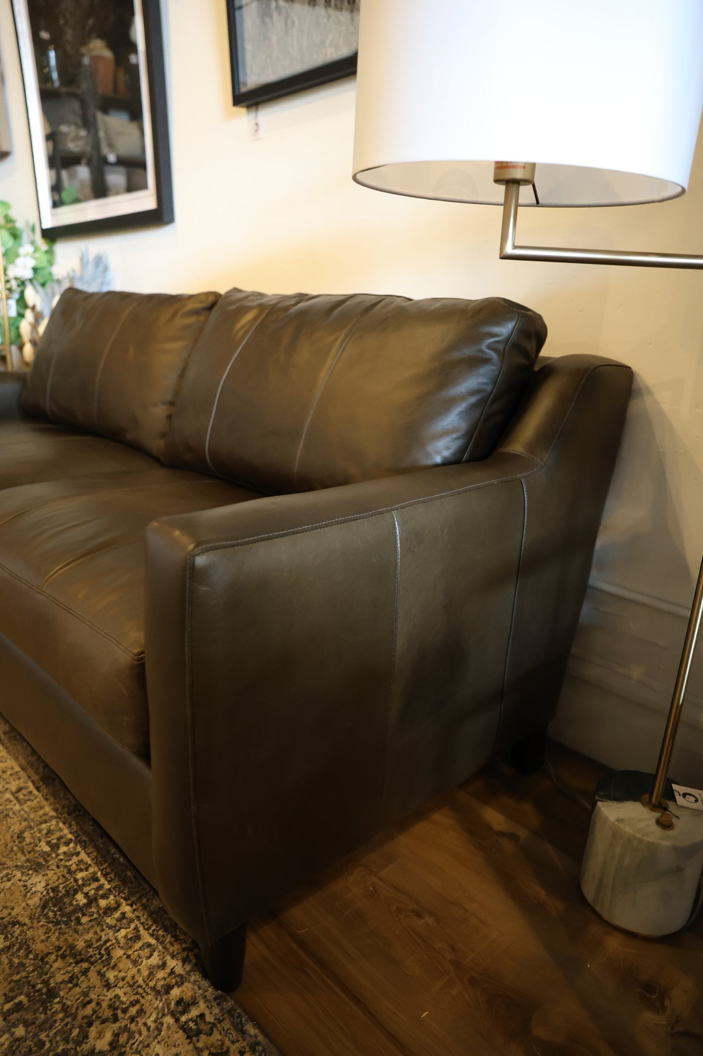 Close-up of the Melville sofa showcasing the natural character and texture of premium aniline leather.