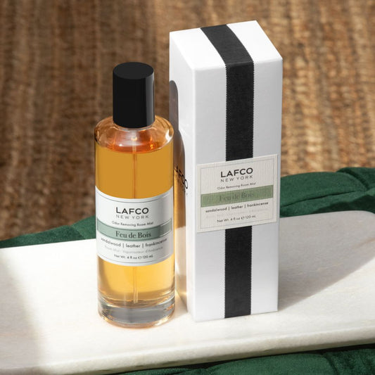 LAFCO Feu de Bois Room Mist with a warm, smoky wood fragrance inspired by a crackling fire.