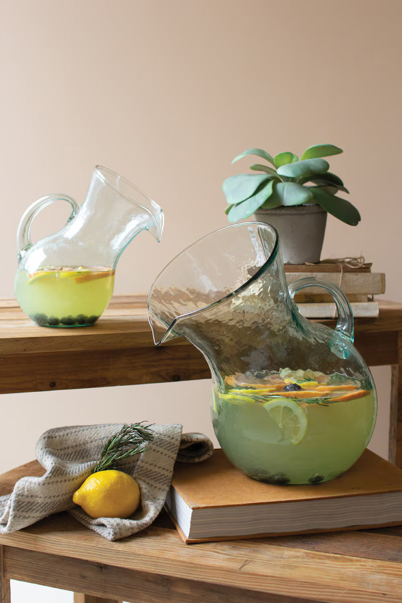 Handcrafted glass pitcher styled for entertaining and everyday display.