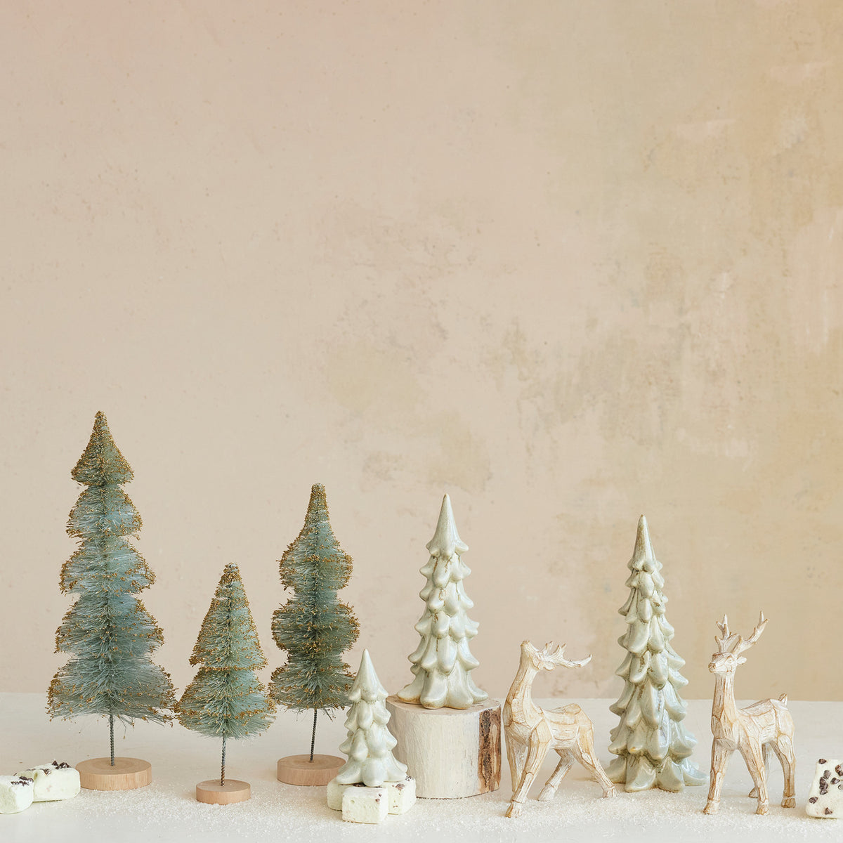 Light green reactive glaze stoneware trees in small, medium, and large sizes with naturally varied ceramic finishes.