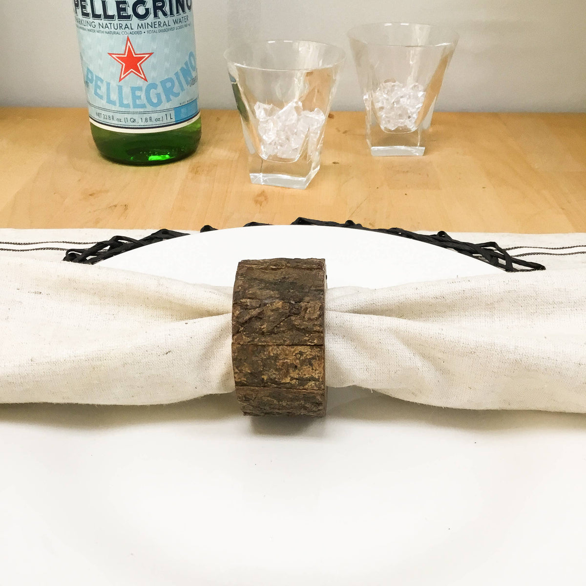 Natural Bark Edge Napkin Ring featuring visible wood grain and rustic bark texture.