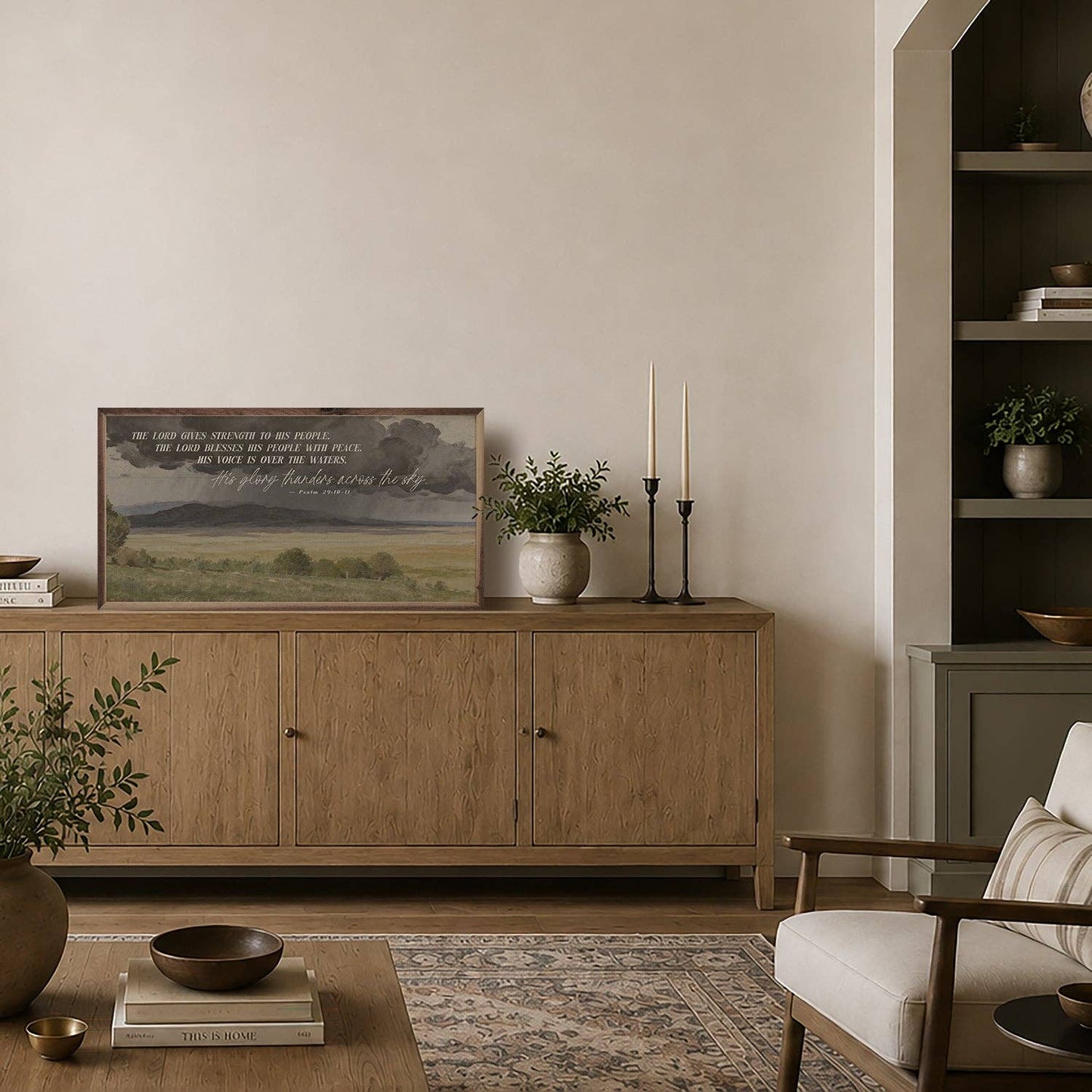 Large Christian wood wall art styled in an entryway with a reclaimed wood console, ceramic pottery, greenery, and woven baskets, creating a peaceful, faith-inspired home.