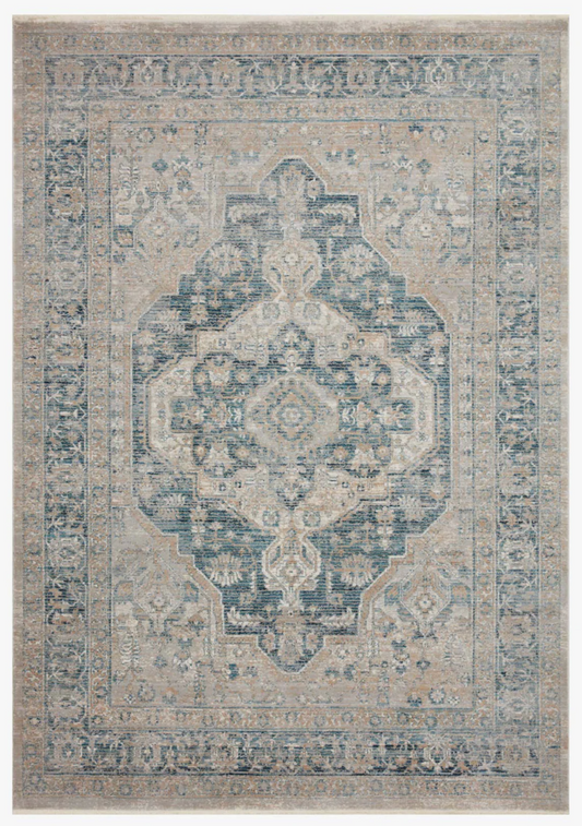 Magnolia Home Elise Rug in Neutral and Blue featuring a vintage-inspired distressed pattern.