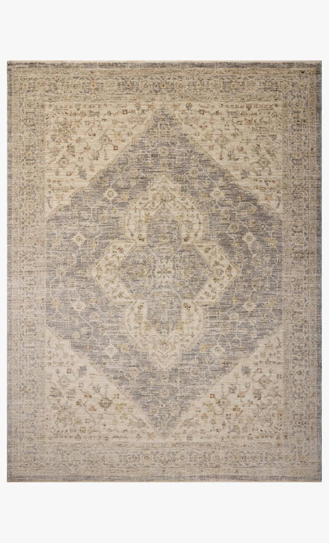Magnolia Home Junie Rug in Denim and Natural featuring antique-inspired motifs and rich tonal variation.