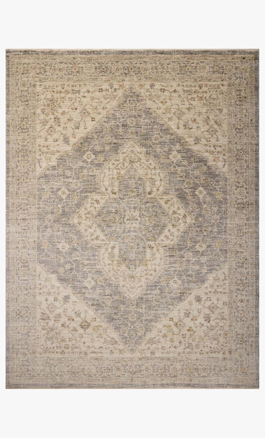 Magnolia Home Junie Rug in Denim and Natural featuring antique-inspired motifs and rich tonal variation.