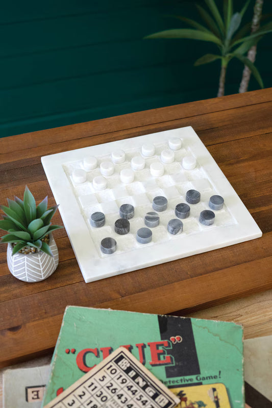 Marble Checkers Game Set featuring a white marble board with black and white game pieces.