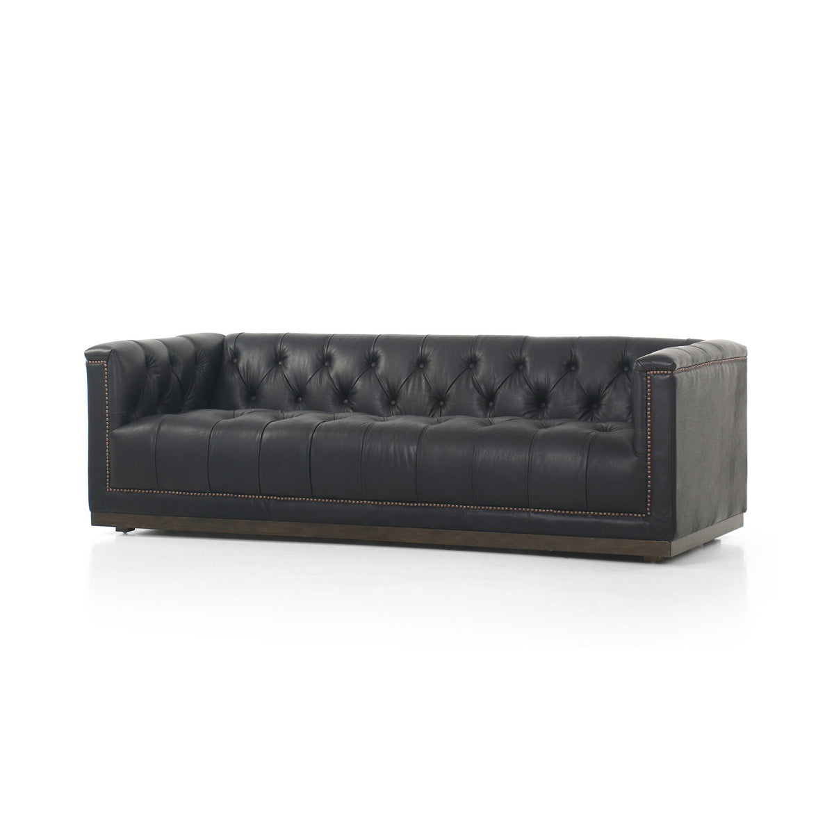 Maxx Leather Sofa upholstered in Heirloom Black top-grain leather with a solid wood base and aged bronze nailhead trim.