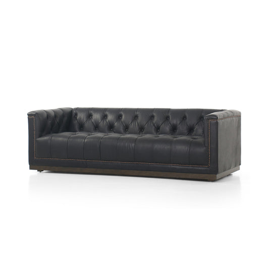 Maxx Leather Sofa upholstered in Heirloom Black top-grain leather with a solid wood base and aged bronze nailhead trim.