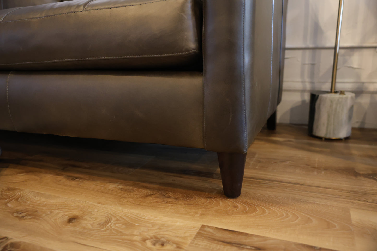 The Melville leather sofa brings timeless craftsmanship and premium comfort to an organic modern living space.