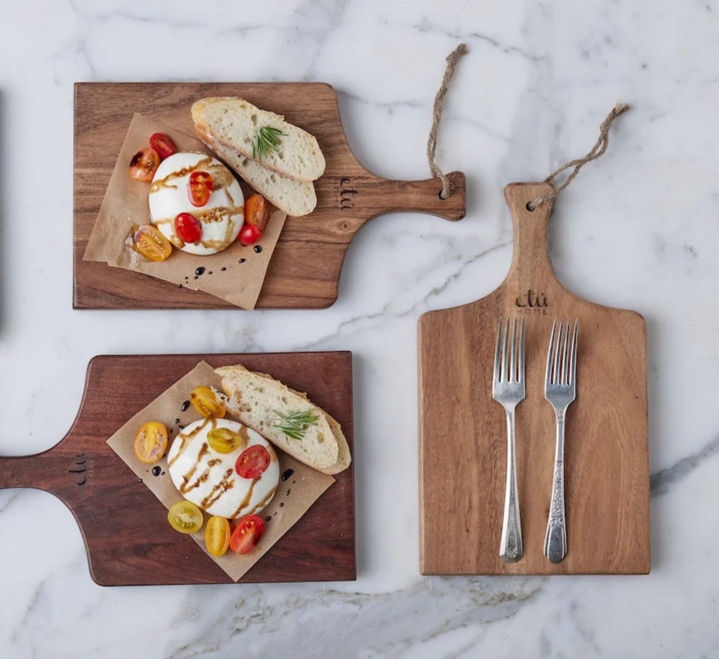 Mini natural wood charcuterie board styled with artisanal cheese and gathered entertaining décor