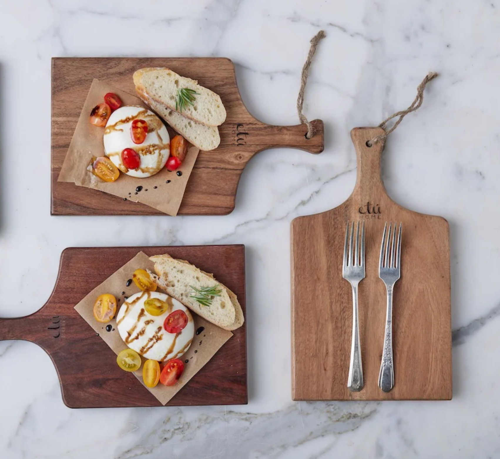 Mini natural wood charcuterie board styled with artisanal cheese and gathered entertaining décor
