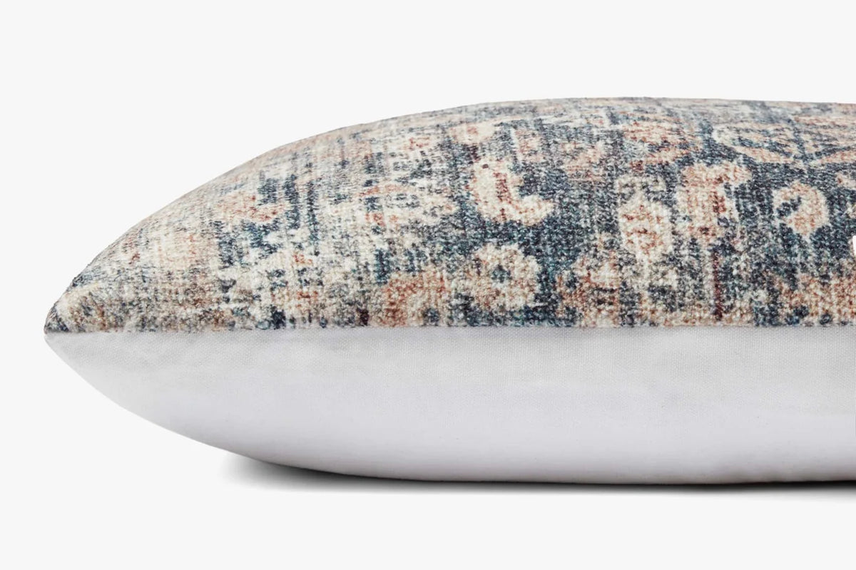Close-up of the Montara Denim and Natural pillow showing its dimensional machine-woven texture in denim blue and warm neutral tones.
