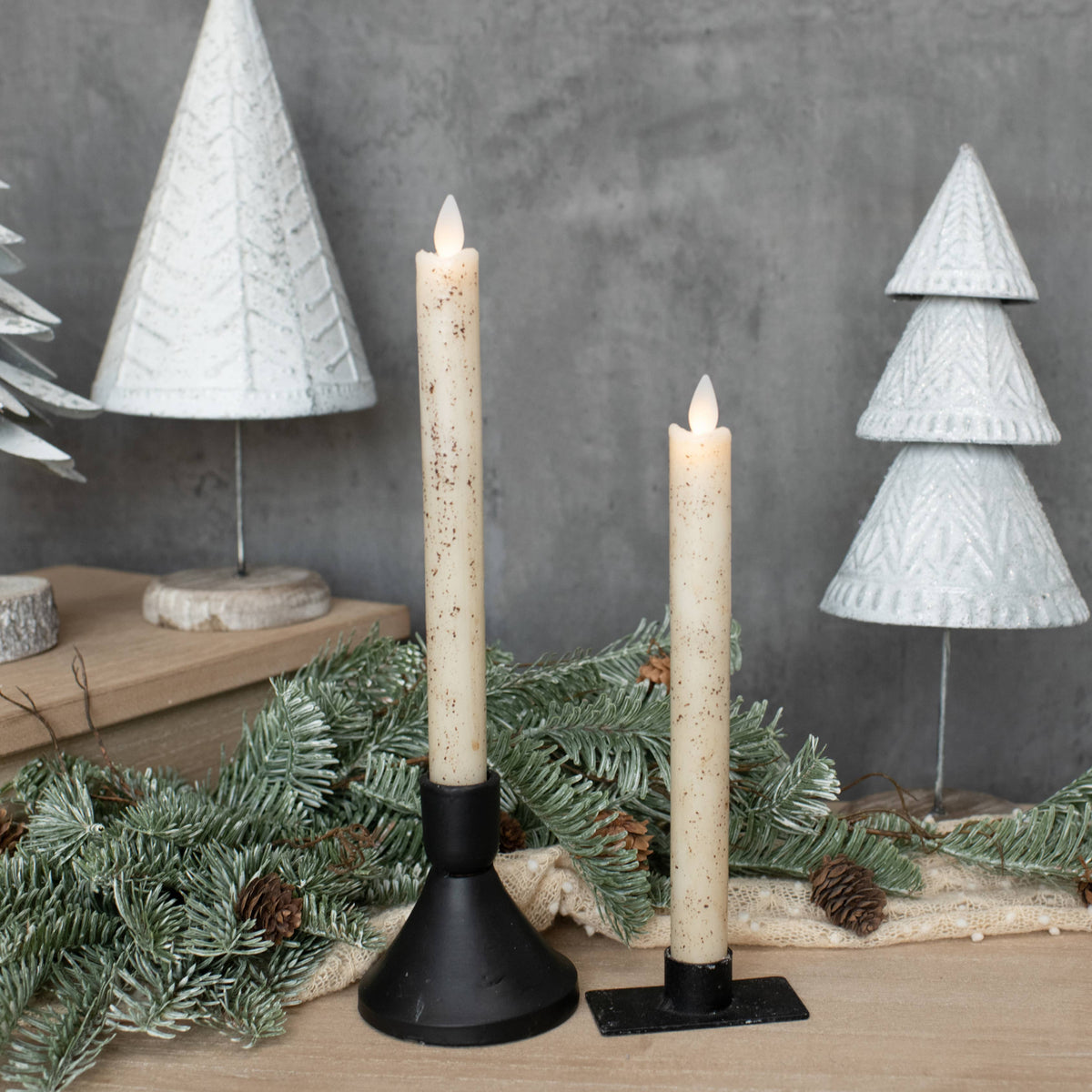 Set of two 9.5-inch cream flameless taper candles featuring realistic moving flames.