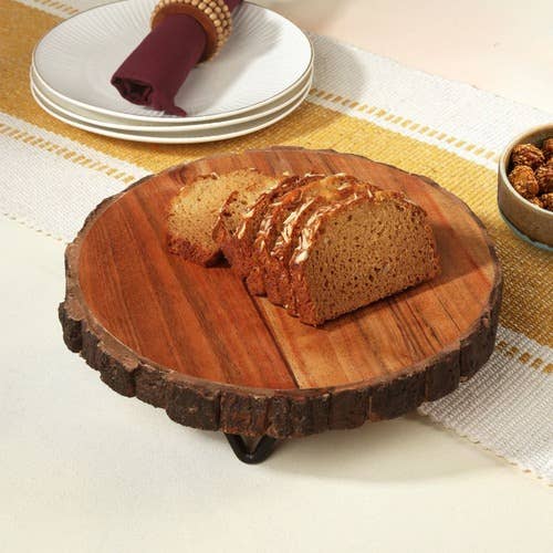 Small Natural Bark Edge Cake Stand with a round wood top and iron feet.