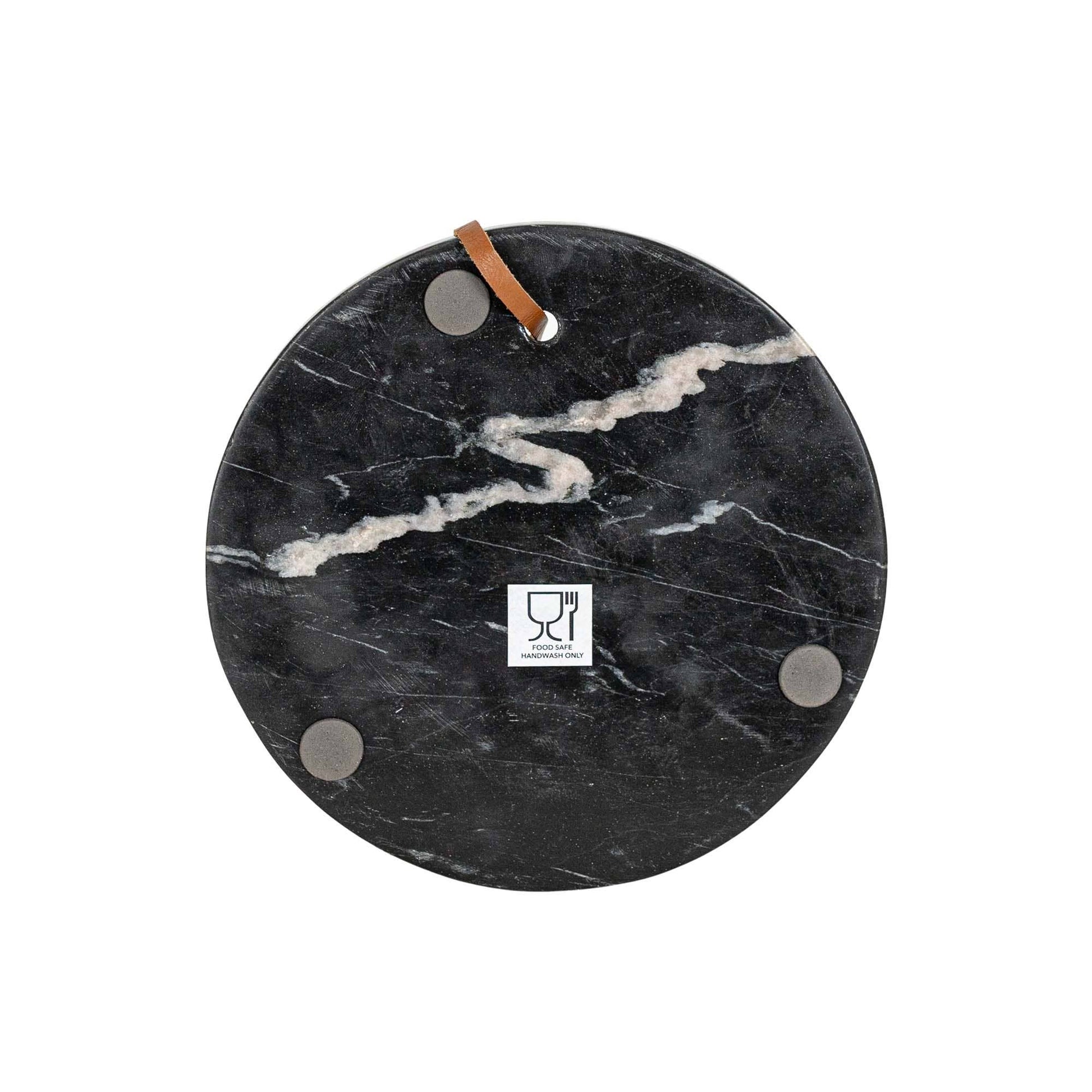 Solid black marble serving board showcasing natural veining and handcrafted character.