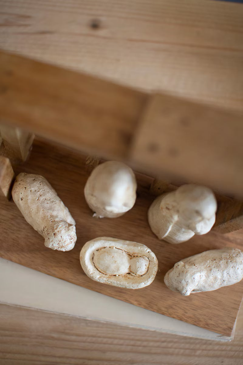 Close-up of the paper mache nativity figures showcasing handcrafted details and soft neutral finishes.