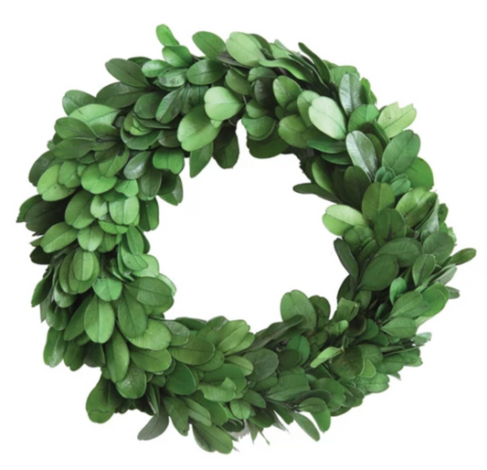 Preserved boxwood wreath featuring lush green foliage and natural texture.