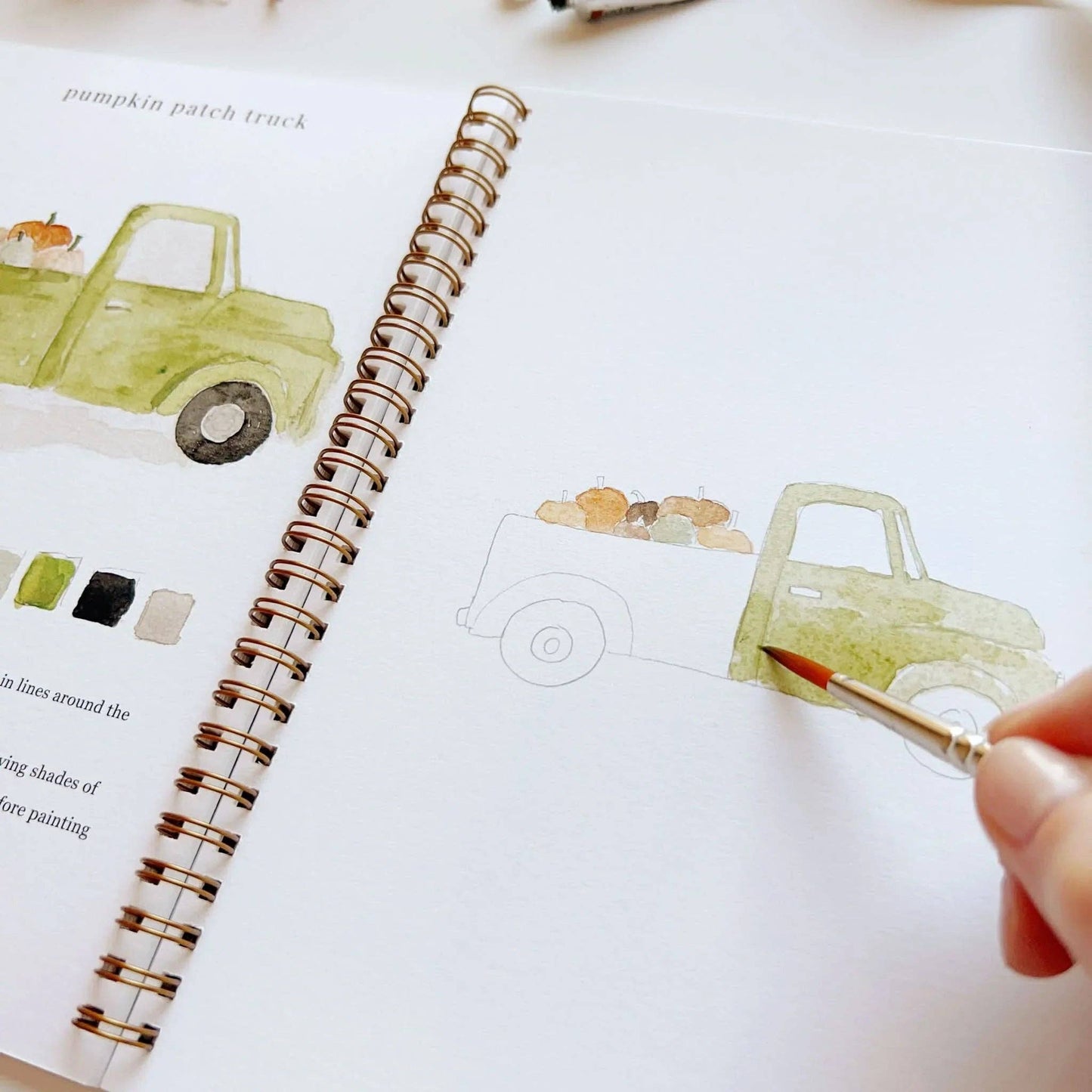 Autumn Watercolor Workbook by Emily Lex featuring twelve guided watercolor projects inspired by the beauty of fall.