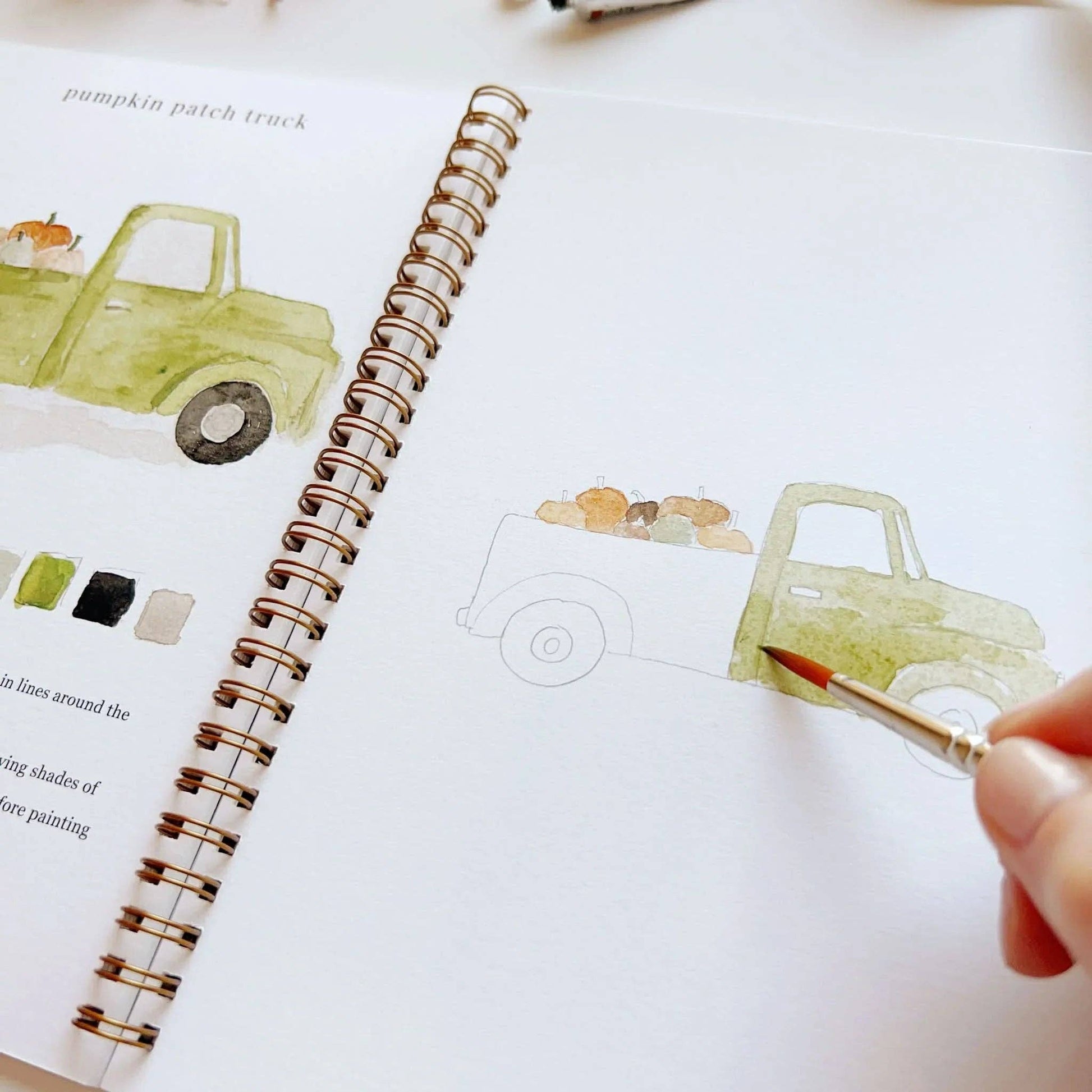 Autumn Watercolor Workbook by Emily Lex featuring twelve guided watercolor projects inspired by the beauty of fall.