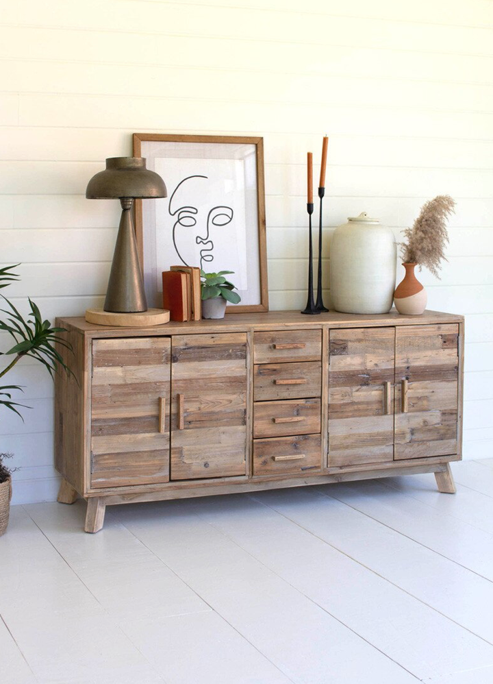 Reclaimed wood storage chest with four doors and four drawers.